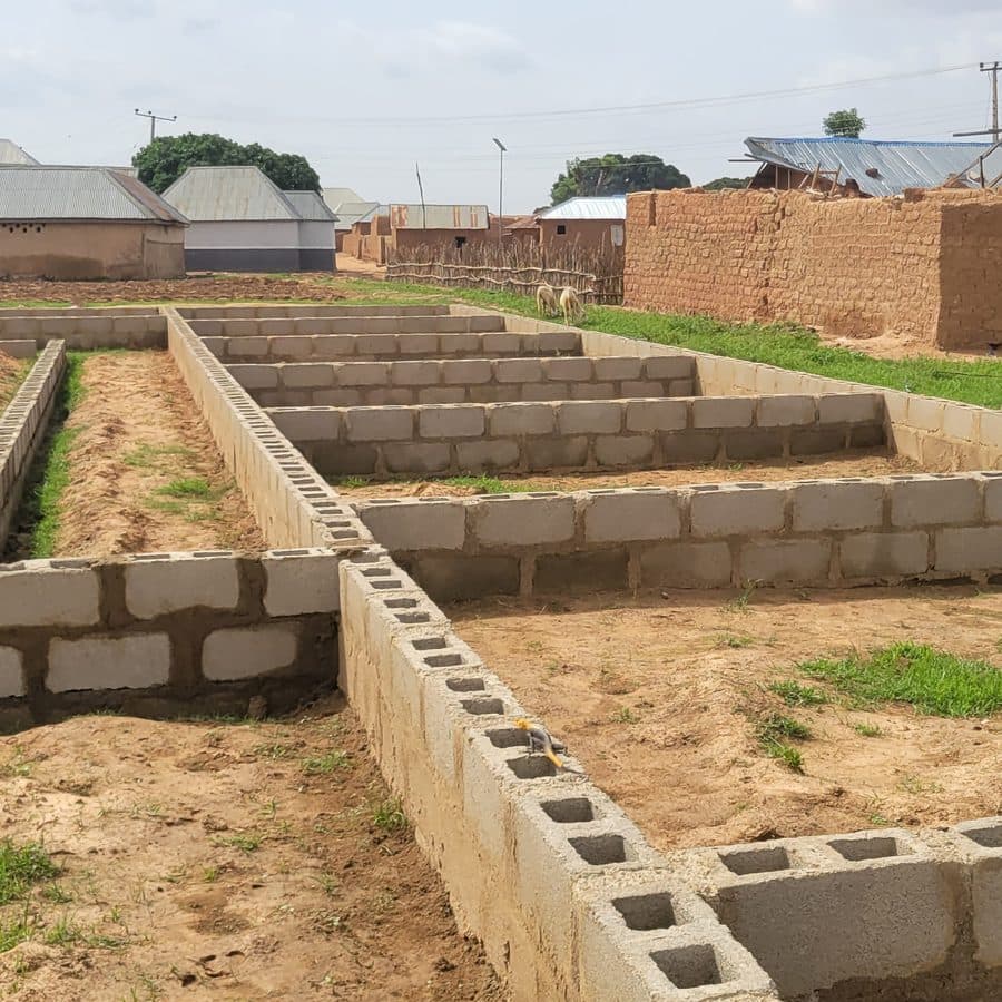 Completed block foundation courses marking out classrooms at the Katanga build site